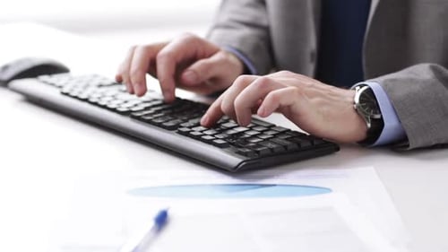 Close Up Of Businessman Hands Typing On Keyboard 15