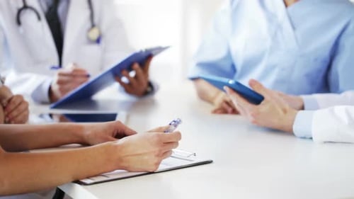 Group Of Doctors At Meeting In Hospital 1