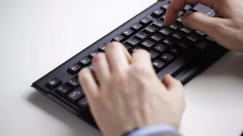 Close Up Of Businessman Hands Typing On Keyboard 22