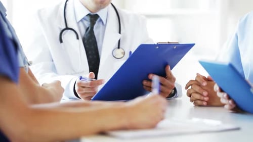 Group Of Doctors At Meeting In Hospital 4
