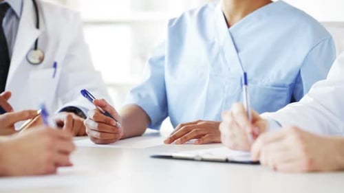 Group Of Doctors At Meeting In Hospital 6