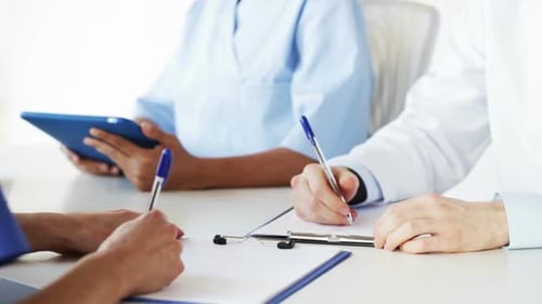 Group Of Doctors At Meeting In Hospital 7