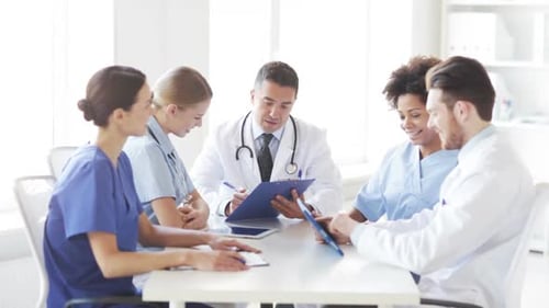 Group Of Doctors Meeting At Hospital Office 1