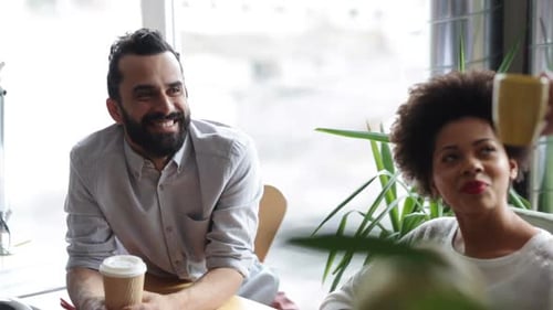 Happy Creative Team With Coffee Talking In Office 6