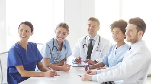 Group Of Doctors Meeting At Seminar In Hospital 1
