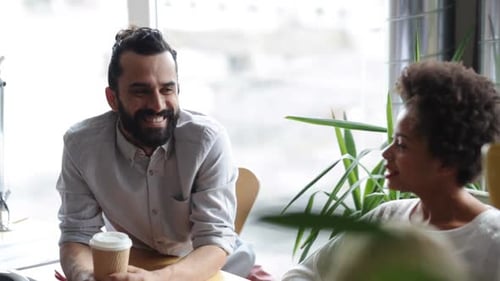 Happy Creative Team With Coffee Talking In Office 9