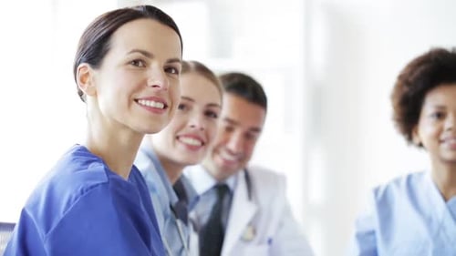 Group Of Doctors Meeting At Seminar In Hospital 8