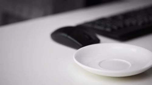 Close Up Of Businessman Typing And Drinking Coffee 4