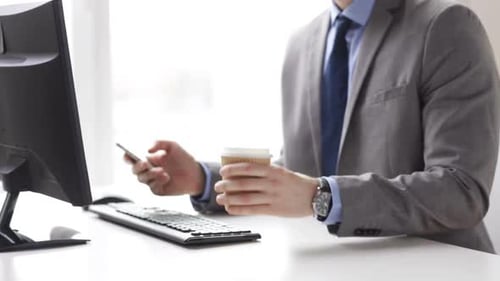 Close Up Of Businessman With Smartphone And Coffee 2