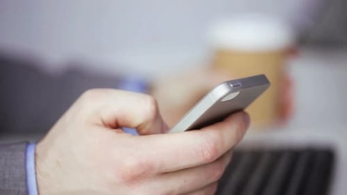 Close Up Of Businessman With Smartphone And Coffee 4