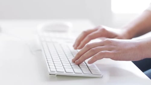 Close Up Of Hands Typing On Computer Keyboard 2
