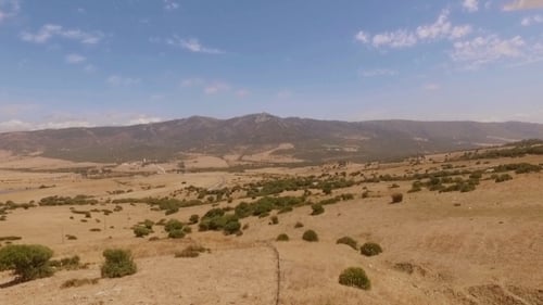 Aerial View From Flying Drone Over Dry Field
