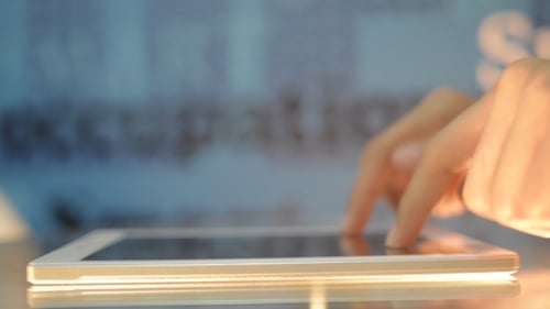 Hands Interact with Tablet Display
