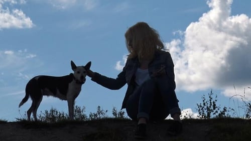 Woman with Dog Petting Affectionate Outdoors