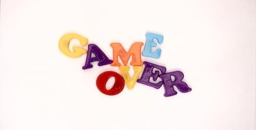 Bright Letter Magnets Spelling Out Game Over