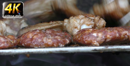 Close Up Meat and Chicken on Metal Grill