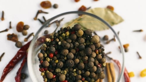 Mixed Peppercorns and Spices in Clear Glass Bowl