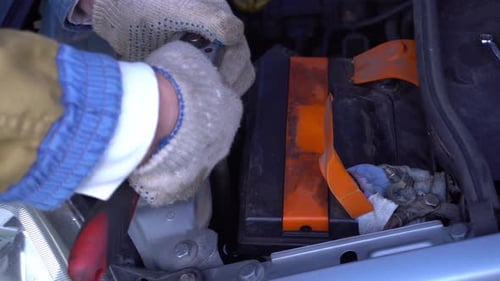 Close Up of Car Battery Being Repaired