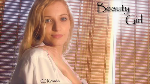 Glamorous Woman Poses in Front of Blinds