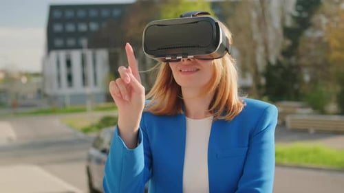 Woman Using VR Headset in City Environment