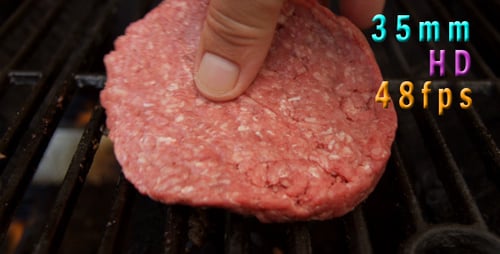 Cooking A Hamburger On Grill 02