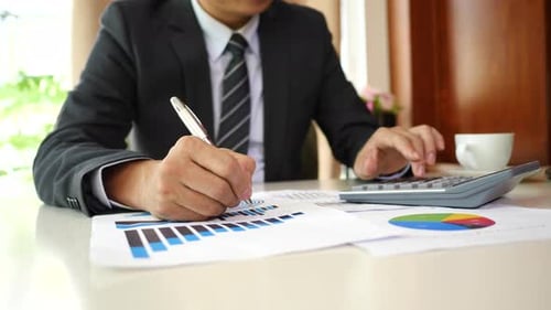 Businessman hands doing analysis planning business project in office.