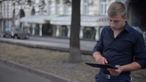 Man Using Tablet in Evening (2)