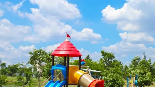 4k timelapse,clouds move or running over playground in the garden