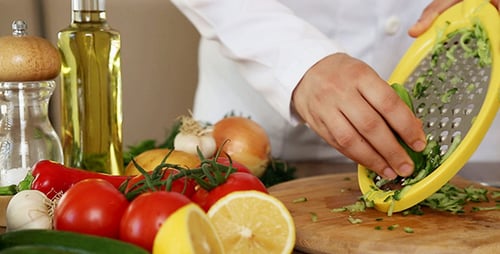 Cucumber Being Grated for Cooking