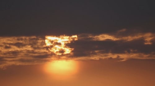 The Big Sun Behind The Clouds 6