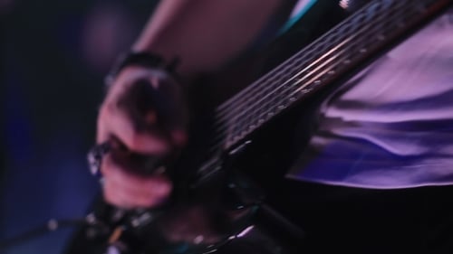 Man Playing Guitar