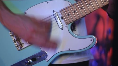 Man Plays Electric Guitar