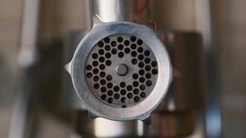 Ground Meat being Processed in Kitchen Appliance