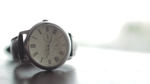 Silver Watch on Table Close Up