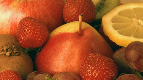Fresh Fruit Display with Apples, Strawberries and Kiwi