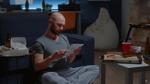 Worried Man Open Warning Document Reading Letter From Bank