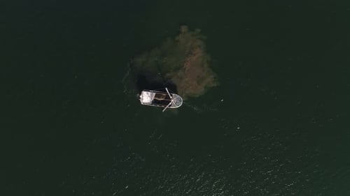 Fishing Vehicle Anchored in the Middle of the Open Sea