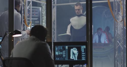 Scientists Test Spaceman Suit in Futuristic Lab