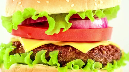 Close up Hamburger with Lettuce, Tomato, Onion, Cheese