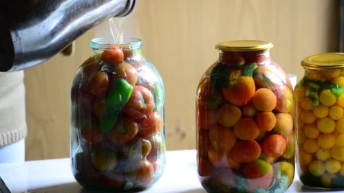 Canning Tomatoes in Glass Jars at Home