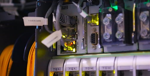 Illuminated Server Room with Modern Technology