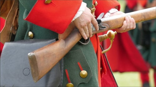 Soldier Prepares Musket, Historical Military Reenactment