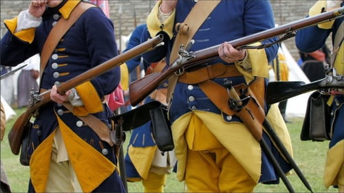 Men in Historical Military Garb with Muskets