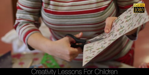 Woman Cutting Paper With Scissors on Patterned Table