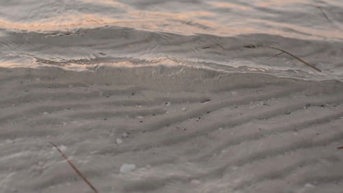 White Sand Through Clear Sea Water