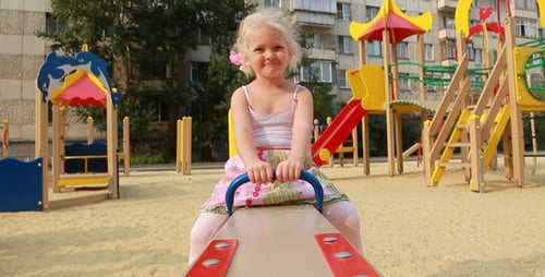 Girl On Swings