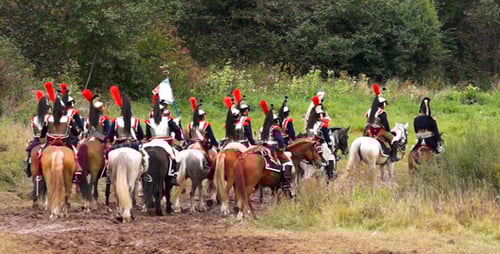 Cavalry Riders in Historical Military Uniforms on Horses