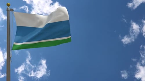 White Blue Green Striped Flag Waving in Blue Sky