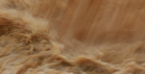 Dirty Water Pouring Into River