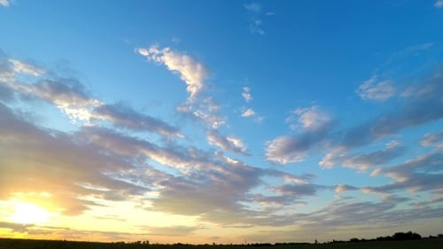 Golden Sky at Sunrise over Rural Field